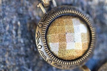 Obraz premium A circle in a shimmering natural stone, close -up jewelry