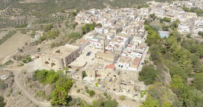 Panoramic aerial view of the historic center of the town of Bernalda, in the province of Matera, Basilicata, Italy. It is a traditional Italian village.