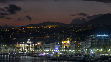 Waterfront of Nice city and Mediterranean Sea day to night timelapse