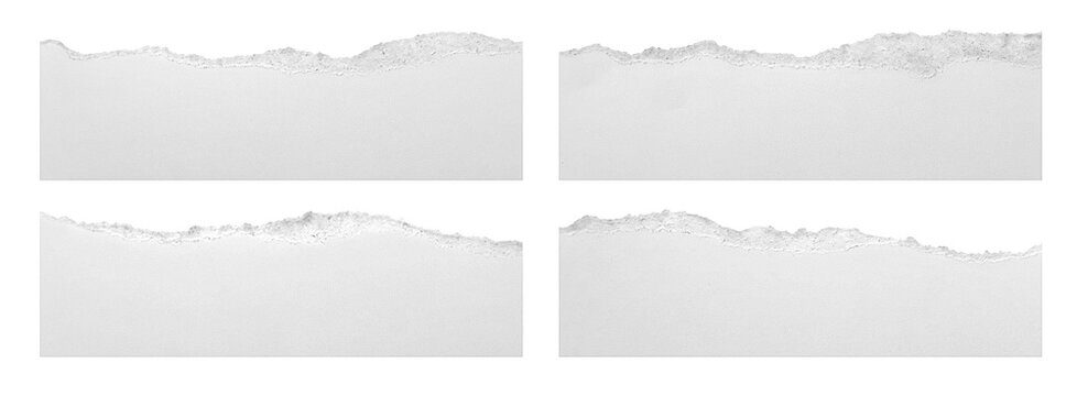 pieces of torn white paper on a transparent background