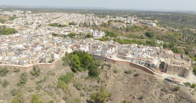 Aerial view of the church of San Bernardino da Siena and the castle located in the historic center of the town of Bernalda, in the province of Matera, Basilicata, Italy.