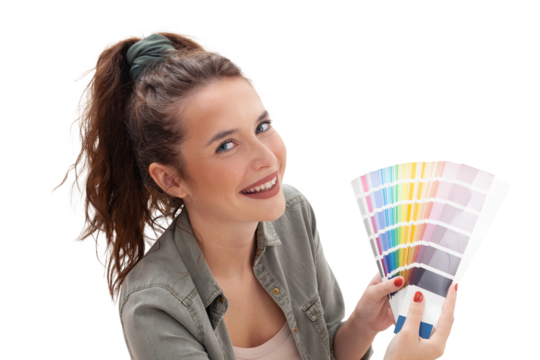 A happy smiling woman showing a color swatch sample palette into the camera. She is isolated on white background while choice a color for painting the walls during her home renovation