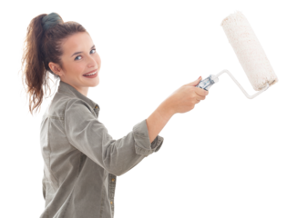 A happy smiling young woman with a paint roller painting white wall at home. She is setting up her new place after moving out. Isolated on white background with copy space. Home renovation concept