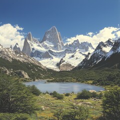 A stunning mountain landscape with a serene lake and snow-capped peaks.