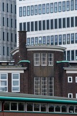 Old building with new buildings hedind