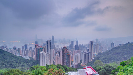 The famous view of Hong Kong from Victoria Peak night to day timelapse.