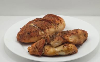 chicken breast with spices, garlic and parsley