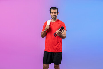 Full body length gaiety shot athletic and sporty young man with towel and drinking water in fitness exercise posture on isolated background. Healthy active and body care lifestyle.