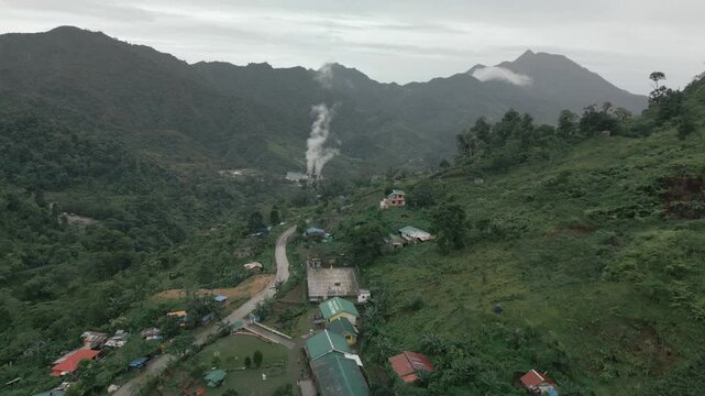 Mountain Village with Smoke in Background