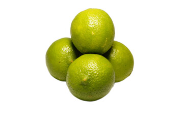 Fresh Green Oranges Stacked on a White Background for Culinary Use
