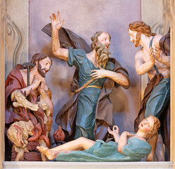 ALESSANDRIA, ITALY - SEPTEMBER 9, 2024: The carved polychrome sculptural group -  Blessing of Noah...