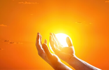 New Year's sunrise, hands on sky background