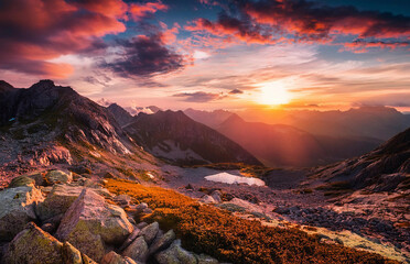 Naklejka premium nature photography a landscape at sunset mountains and meadows image