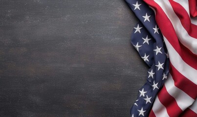 Fototapeta premium Celebration of Veterans Day with the American flag draped on a dark rustic surface