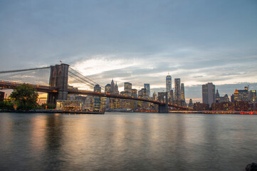 Sunset Over the Brooklyn Bridge, Capturing NYC’s Iconic Landmark in Golden Light