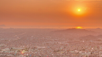 Aerial sunset view of Lima skyline timelapse from San Cristobal hill.