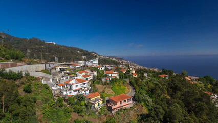 Aerial view from the mountain over the rooftops from cable car on Madeira timelapse hyperlapse.