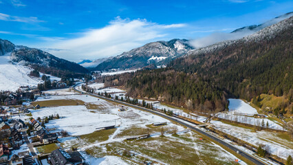 Kranjska Gora, a picturesque ski resort in Slovenia, transforms into a winter wonderland during the snowy season. Nestled in the Julian Alps, this charming town offers pristine slopes, cozy chalets