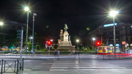 Giuseppe Garibaldi monument and tower of the Sforza Castle - Castello Sforzesco timelapse hyperlapse, Milan, Italy