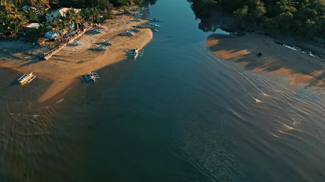 Drone Tilt Up Revealing Water and Mountains