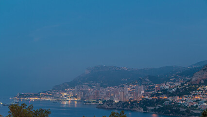 Cityscape of Monte Carlo night to day timelapse, Monaco before summer sunrise.