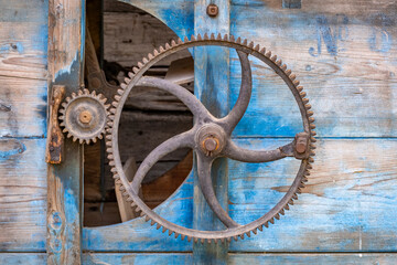 close shot of metal wheels in a farmers machine