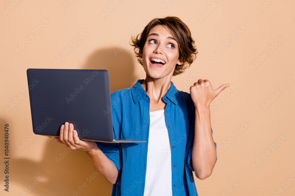 Poster photo of young cheerful data analytic in business operations woman point finger charts using laptop 