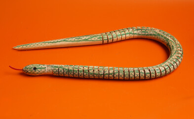 wooden snake figurine green symbol of 2025