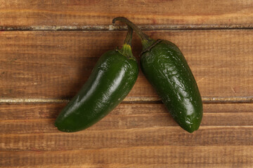 jalapeno pepper on wooden background