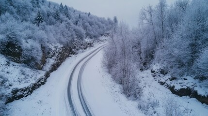 Winter snowy road along the forest	