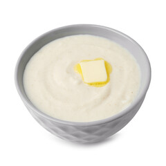Tasty cooked semolina porridge with butter isolated on white
