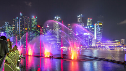 Light and Water Show along promenade in front of Marina Bay Sands timelapse