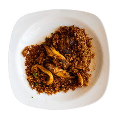 Traditional Spanish paella with various meats, chicken and various seafood. Isolated over white background