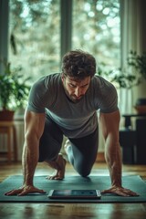 Fototapeta premium Man exercising indoors on a yoga mat while using a tablet for a fitness routine in a well-lit living space. Generative AI
