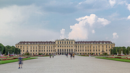 Fototapeta premium Beautiful view of famous Schonbrunn Palace timelapse hyperlapse with Great Parterre garden in Vienna, Austria