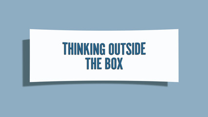 Thinking outside the box. A card isolated on blue background.