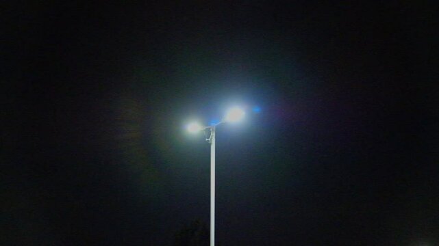 Faulty flickering LED Street lamp in a UK street. 