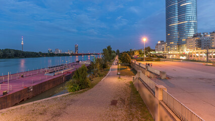 Beautiful cityscape with modern buildings day to night timelapse, the tallest skyscraper in Austria