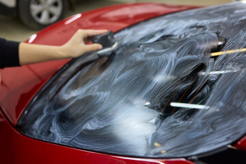 Car Detailing Meticulously Cleaning Your Windshield with Care for an Immaculate Appearance