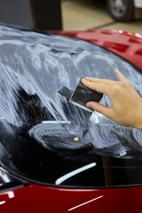 Car Detailing Meticulously Cleaning Your Windshield with Care for an Immaculate Appearance