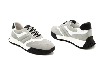 Sneakers. Pair of fashionable suede leather shoes isolated on white background. View from all sides.	