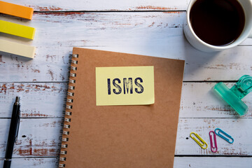 There is sticky note with the word ISMS. It is an abbreviation for Information Security Management...