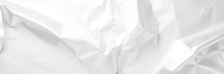Obraz premium Shiny silver foil texture with reflective surface, silver paper, wrapping paper