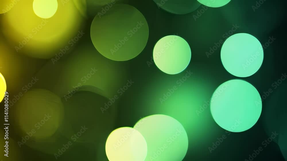 Aufkleber seamless looping green and yellow bokeh light background with soft glowing circles and gentle motion