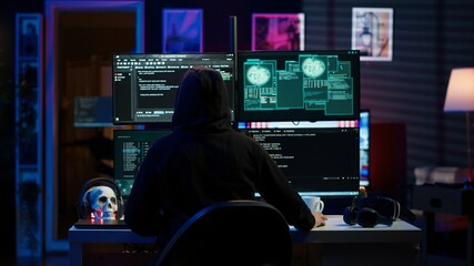 Hacker arriving in underground HQ, ready to start coding malware designed to exploit network...