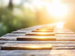 Sunlit wooden path leading to bright horizon.