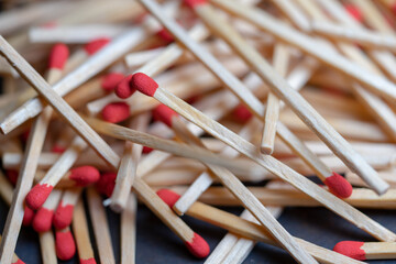 Cluttered and disorganized set of red-headed phosphor sticks