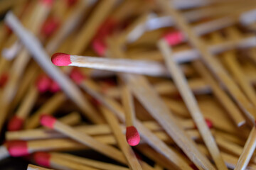 Cluttered and disorganized set of red-headed phosphor sticks
