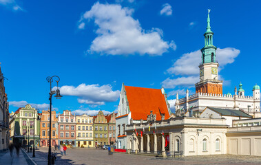 View of historic building of Weighing house and Town Hall in centre of Poznan Market Square in...