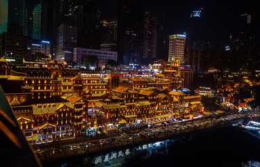 Night view of the Hongyadong Cave in Chongqing, China. Hongyadong cave is one of the famous tourist attraction frequented by tourists.